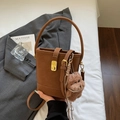 Brown vintage water bucket bag in matte PU leather with a cute plush puppy pendant - Brown with Pendant