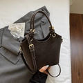 Dark brown suede bucket bag with wavy edges and elegant gold ring hardware details - Coffee No Charm
