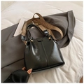 Glossy black leather bucket bag with an ethnic patterned wide shoulder strap and gold studs - Black