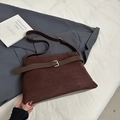 Detail of dark brown suede tote bag featuring silver metal buckle and premium texture - Coffee