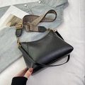 Retro black oil wax leather crossbody bag with a wide geometric woven shoulder strap - Black