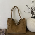 Minimalist caramel brown suede tote bag with golden buckle and slim shoulder straps - Brown