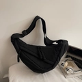 Versatile black crescent crossbody bag with woven zipper details and wide strap - Large / Black
