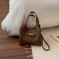 Brown lychee leather bucket bag with silver twist lock and crossbody strap - No Pendant / Brown