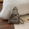 Minimalist taupe lychee leather bucket bag with silver buckle and detachable shoulder strap - No Pendant / Gray