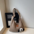 Oatmeal knit shoulder bag featuring cute 3D plush lamb and wooden horn button closure - Khaki