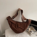 Deep brown minimalist dumpling crossbody bag with adjustable wide strap and braided zipper detail - Small / Coffee