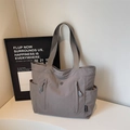 Minimalist large capacity dark grey tote bag with front zipper pockets and top handles - Gray