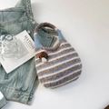Knitted striped tote bag in blue and white with a cute mushroom charm and bow accent - Blue