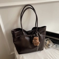 Large dark brown vintage tote bag in glossy faux leather with plush dog charm - Coffee with Pendant