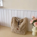 Chic beige faux shearling tote bag with fuzzy texture and leather brand label - No Pendant / Milk Tea