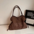 Detailed view of leopard print stitching with pink dots and embroidery on tote bag - Brown