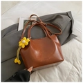 Brown oil wax leather bucket bag with top handles, crossbody strap and flower charm - With Pendant / Reddish Brown With Pendant
