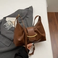 Brown vintage pleated shoulder bag with a crescent gold buckle in an artistic setting - No Pendant / Brown