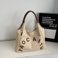 Minimalist beige canvas tote bag with brown leather handles and 3D letter design - Beige Grey