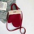 Red glove-shaped crossbody plush bag with fleece trim and adjustable shoulder strap - Red