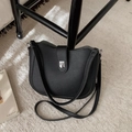 Women's black lychee pattern leather bucket bag with silver metal buckle and strap - Black