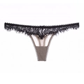 Detailed view of women's black eyelash lace thong with bow accent and beige panel - 001P Black