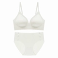 Detail view of seamless cream white bra and high-waist panty set with triangle cup design - Milky White