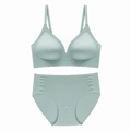 Detail view of mint green seamless lingerie set with V-neck mesh and soft fabric - S / Light Green