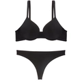Detail of seamless black lingerie set featuring padded push-up bra and thong - S / Bra And Thong Set / Black