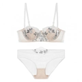 Detail view of French floral embroidery and sequins on white lace bra and panty set - 70B / Top And Bottom / White