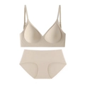 Vue à plat d'un ensemble de lingerie beige sans couture avec soutien-gorge et culotte - XS / Peau Abricot