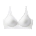 Detailed view of the seamless white bra featuring delicate wavy scalloped edges - White