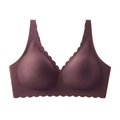 Detail of plum seamless bra showing scalloped wavy edges and smooth elastic fabric - Brown