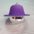 Close-up of a purple felt hat ornament with a silver buckle on a mirror disco ball - 5cm Ball Purple