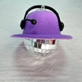 Close-up of purple felt hat ornament with mini black headphones on a disco ball - 5cm Ball With Headphones Purple
