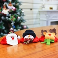 Three Christmas wine bottle covers featuring Santa Claus, Snowman and Reindeer characters - Coaster Set