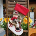 Creative Christmas plush stocking with 3D snowman on bicycle for holiday home decoration - Christmas Snowman (1717)