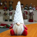 Close-up of a Christmas gnome with grey faux fur hat and red striped knit arms - Gray Hat (201925)