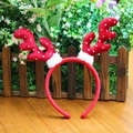 Red Christmas reindeer antler headband with sequins and plush trim on wooden background - Red Antlers (22x22cm)