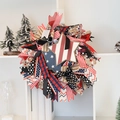 Close-up of patriotic US Independence Day wreath with colorful ribbons and star decoration - Independence Day Star Wood Sign Wreath 45cm