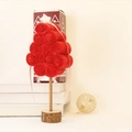 Detail of red wool felt Christmas tree figurine with a white star and natural wood base - Large Red Felt Coil Tree 31.5cm