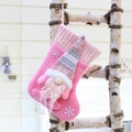 Pink Christmas stocking with a long-bearded knit gnome doll and white snowflake decor - 32030 Small Stocking Style Pink