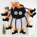 Halloween long-leg witch spider hanging ornament with striped legs and decorative bows - Spooky Halloween Wreath