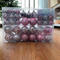 Ensemble détaillé de boules de Noël roses et argentées dans une mallette transparente - Rose
