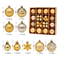 Dettaglio di palline di Natale dorate assortite in dimensioni da 6 cm e 3 cm - Stile Oro