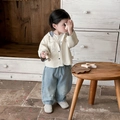 Completo bambino giacca beige con stampa dinosauro e jeans in denim azzurro per primavera - Beige / 73cm