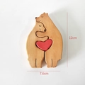 Detailed close-up of handcrafted wooden bear figurines with a red heart showing 12cm height - Bear