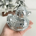 Detailed macro view of a silver disco ball duck ornament with reflective mirror glass tiles - Silver Mirror Duck