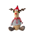 Close-up of Christmas reindeer plush doll wearing a red knit hat and grey sweater - Hatted Reindeer Sitting Boy Style