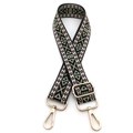 Close-up of geometric jacquard embroidered bag strap with golden metal swivel hooks - No.7 Black Matcha Green