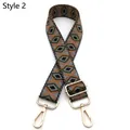 Close-up of geometric jacquard bag strap with gold metal hooks and adjustable buckle - No. 2 Black Grey Army Green