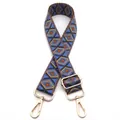 Detail of adjustable woven bag strap with retro blue and orange geometric diamond patterns - No. 3 Lake Blue Brown