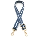 Detail of adjustable canvas bag strap with white arrow pattern and golden metal buckles - No.14 Lake Blue