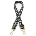 Detail view of adjustable black and white arrow pattern shoulder strap with gold metal hardware - No. 13 Dark Gray
